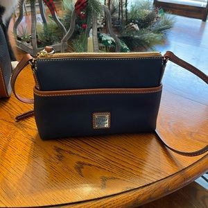 Dooney and Bourke pocketbook   Never used